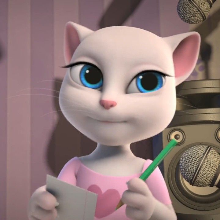 Talking Angela holding green pencil and paper in each hand.